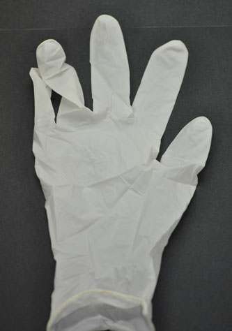 FIG.1 INSPECCIÓN VISUAL DE LOS GUANTES