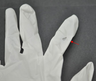FIG. 3 PRESENCIA DE PERFORACIONES EVIDENTES